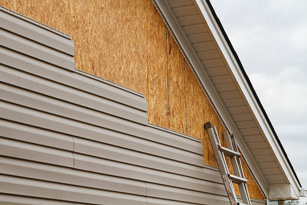 Professional Emergency Siding Repair technician working in Terryville, NY